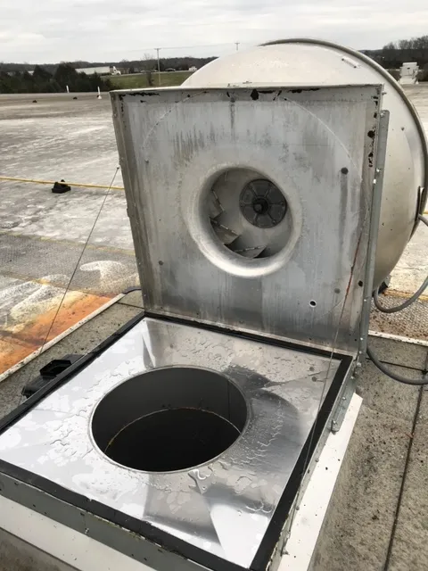 Hoffman Estates hood cleaning technician servicing a commercial kitchen exhaust system